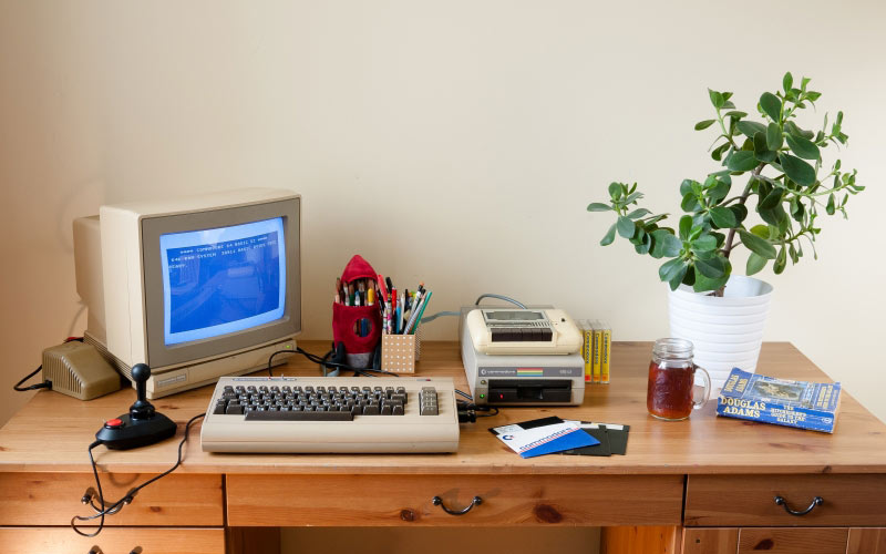 commodore 64, 1541 drive, datasette, joystick, commodore 1802 display, old computer, retro computer, desk, room