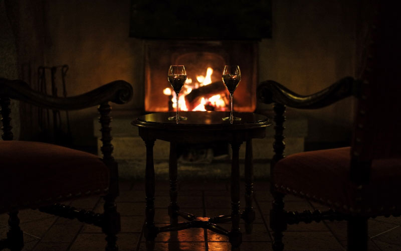 mont blanc, hotel, village, la salle, courmayeur, italy, winter, wine, night, warm, interior, fireplace, darkness, room, lighting, chairs, luxury, glasses, livingroom, armchairs