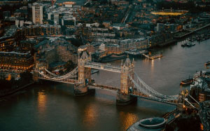 cityscape, aerial photography, city, metropolitan area, water, urban area, metropolis, bridge, river, night, waterway, skyline, downtown, architecture, harbor, landscape, bird