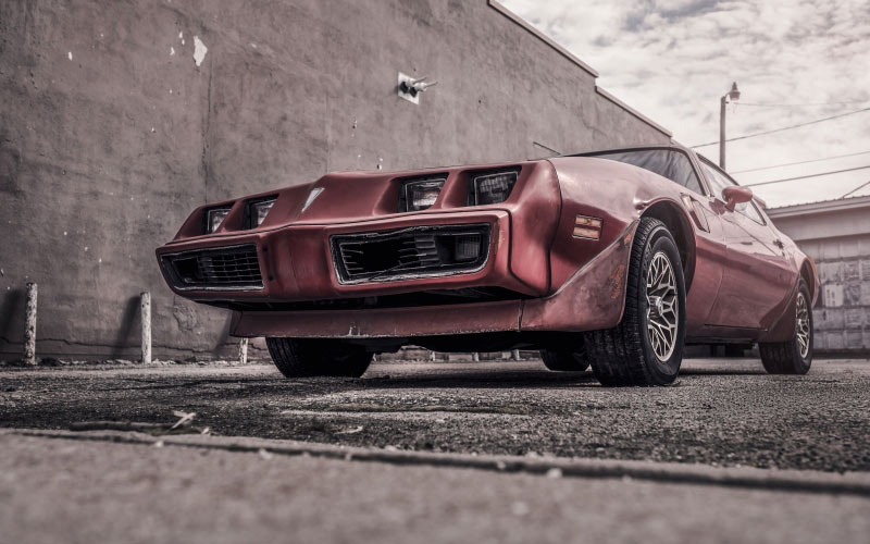 red, pontiac coupe, cloudy, pontiac, coupe, urban, car, grunge, fast, sports car, vehicle, transportation, bumper, tire, old-fashioned, close-up