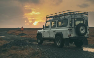 suv, road, signage, car, land, vehicle, transportation, sunset, nature