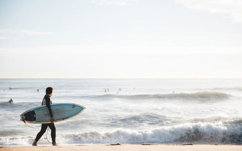 surfer, beach, sea, ocean, sport, surfboard, male, man, person, men, people, surfing, swimsuit, vacation, watersport