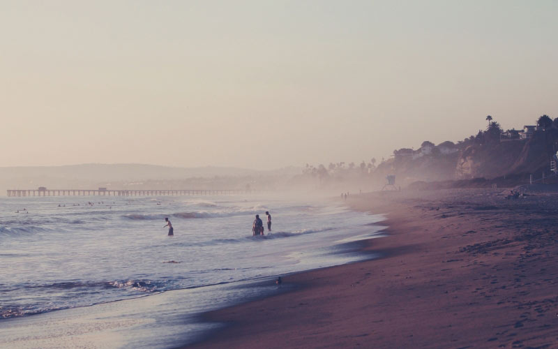 beach, sea, coast, sand, ocean, horizon, people, sunrise, sunset, mist, morning, shore, waves, dawn, dusk, evening, bay, water, wind