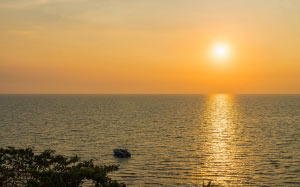 beach, landscape, sea, coast, water, nature, outdoor, ocean, horizon, light, sky, sun, sunset, boat, shore, summer, vacation, travel, evening, orange, relax, paradise, tropical, seascape, bay, exotic