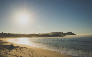 beach, sea, coast, water, sand, ocean, horizon, clouds, sun, sunset, sunlight, shore, waves, shoreline, dusk, evening, bay, wind