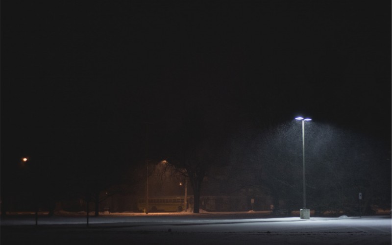 walkway, trees, night, park, lamp post, light, dark, evening, illuminated, street light, outdoors, road, city, street, snowing