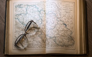 table, books, reading, open, vintage, antique, retro, old, europe, paper, pages, map, atlas, education, research, textbook, science, literature, study, library, text, glasses, university, school, history, wisdom, knowledge